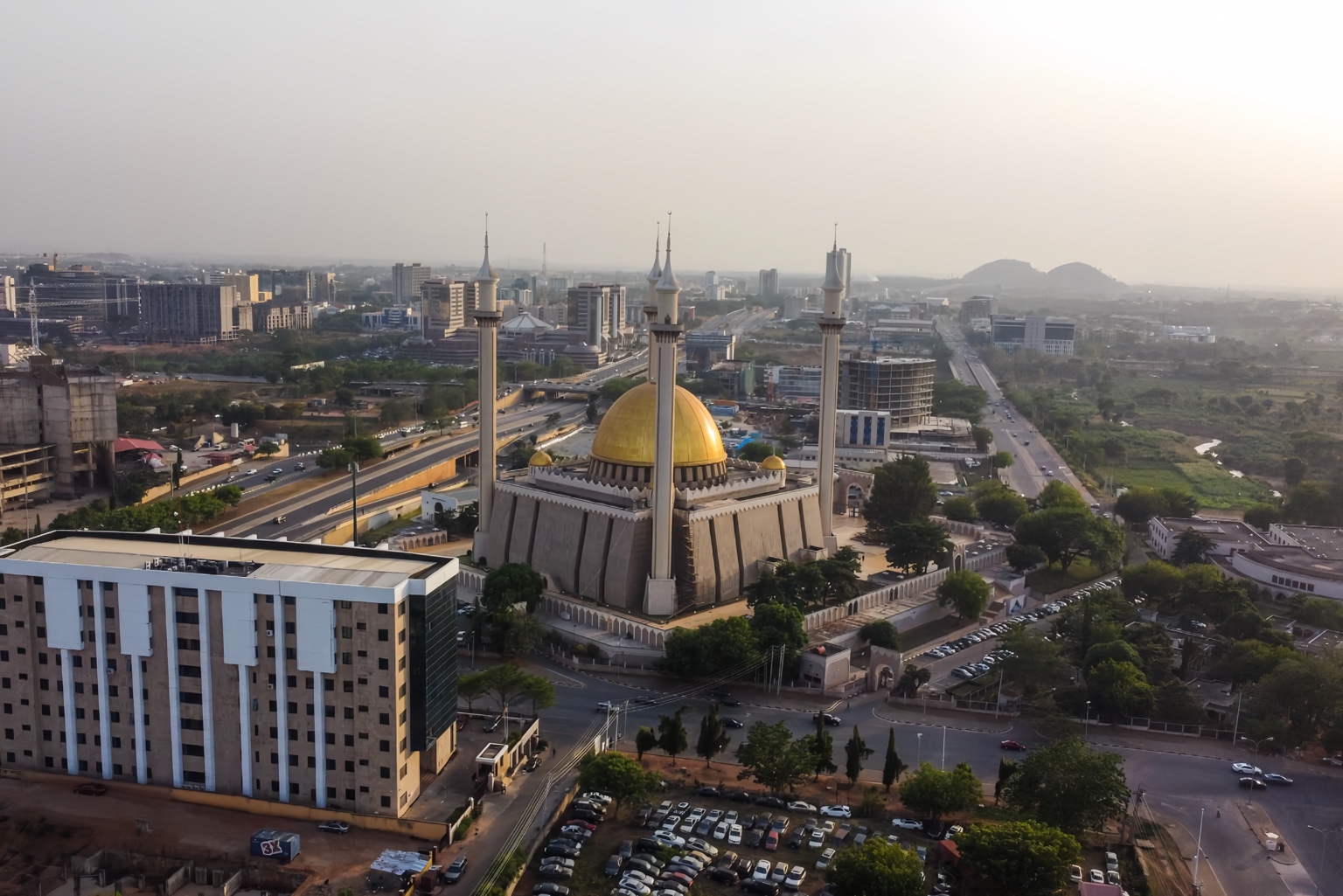 Aerial view of Abuja skyline and Central Mosque