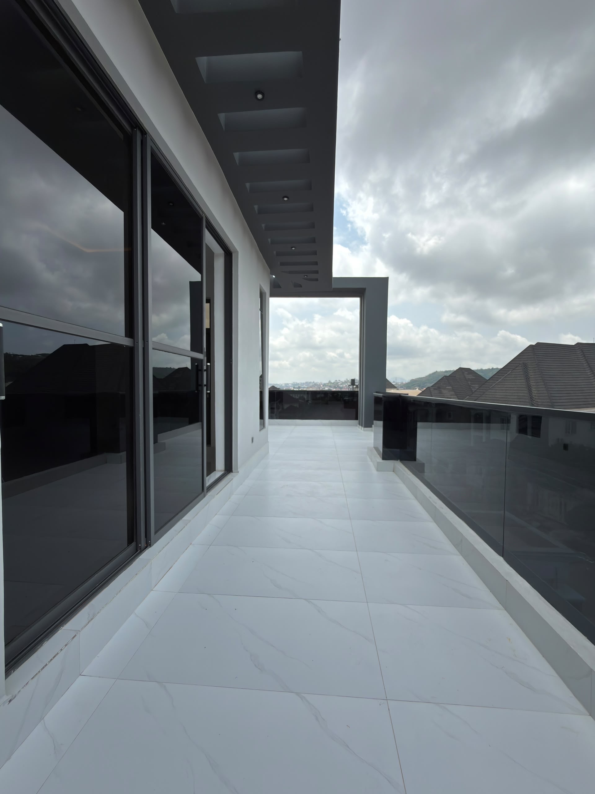 Modern balcony overlooking a residential area