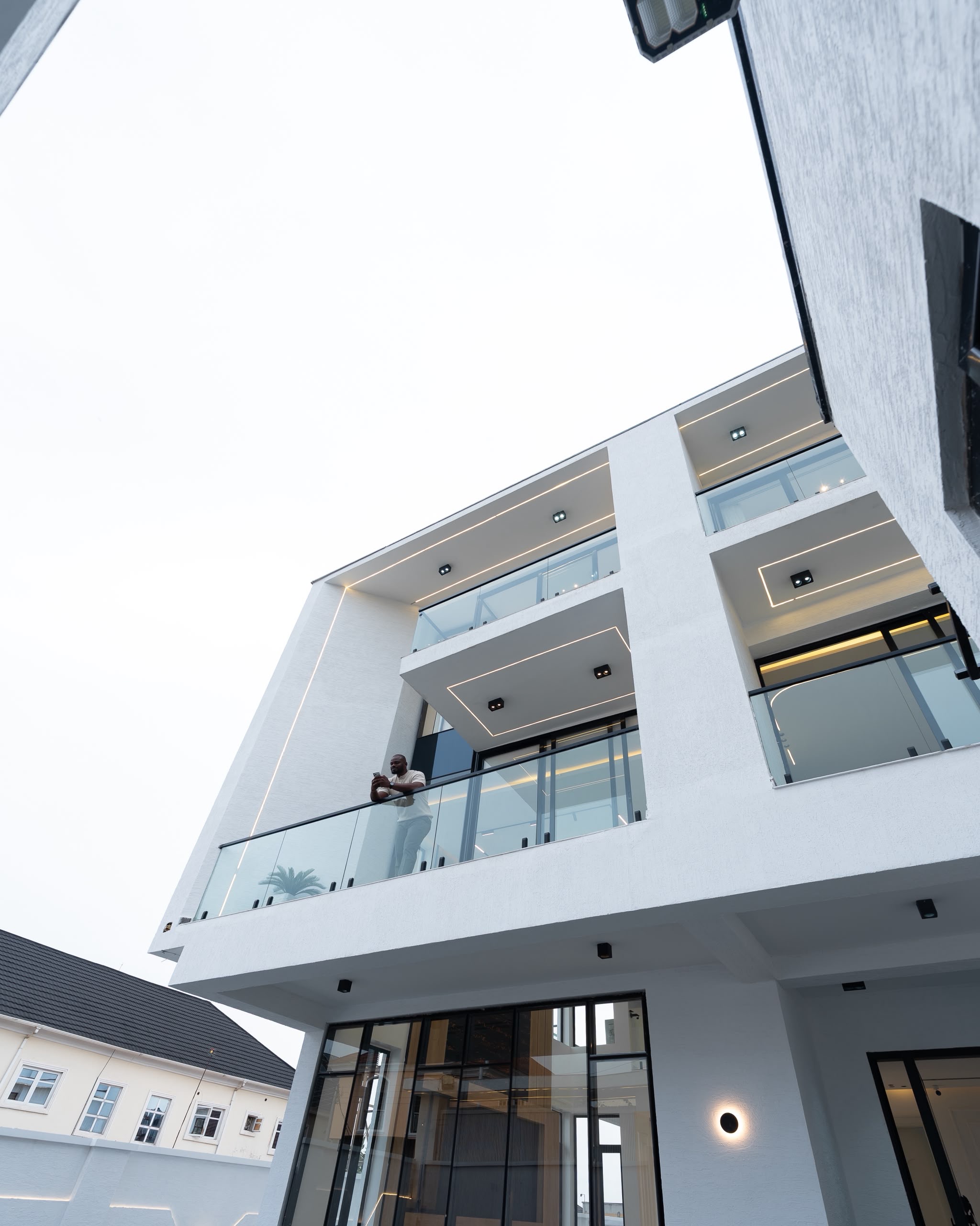 Modern multi-level property with glass balconies